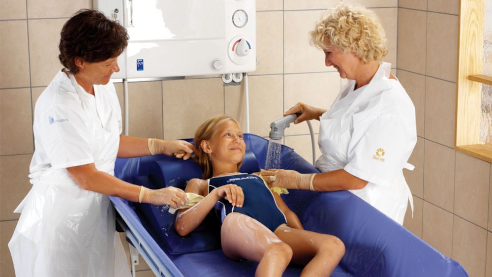 Concerto HeightAdjustable Shower Trolley by ArjoHuntleigh