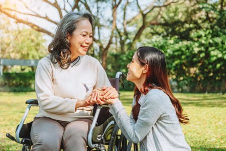 mother-and-daughter-wheelchair