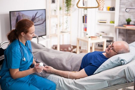 patient-in-home-hospital-bed-with-nurse