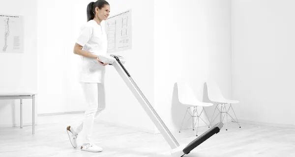 Therapist moving the Seca 777 scale effortlessly