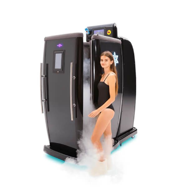 Woman going inside a cryotherapy chamber for a full body session