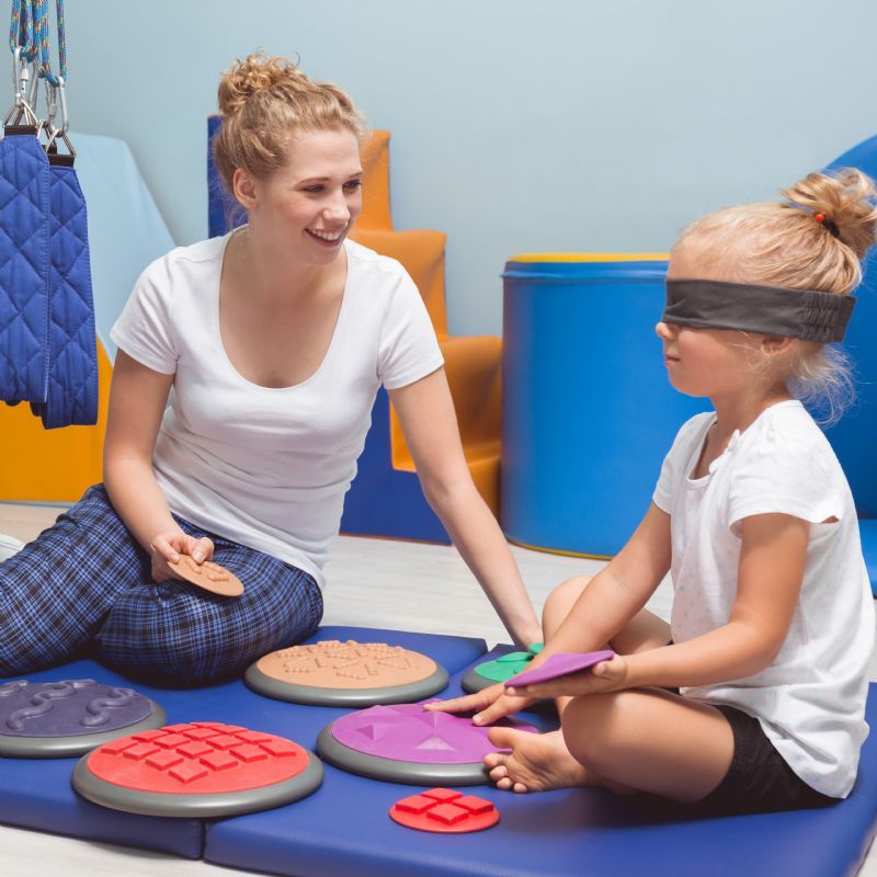 girl-blindfolded-in-sensory-therapy