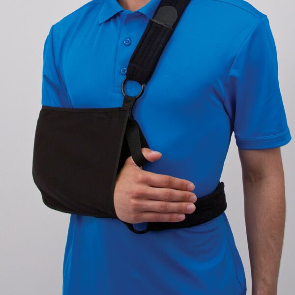 Man using a shoulder support after a subluxation