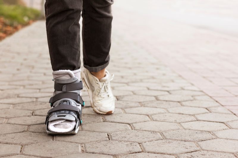 person-walking-with-medical-boot