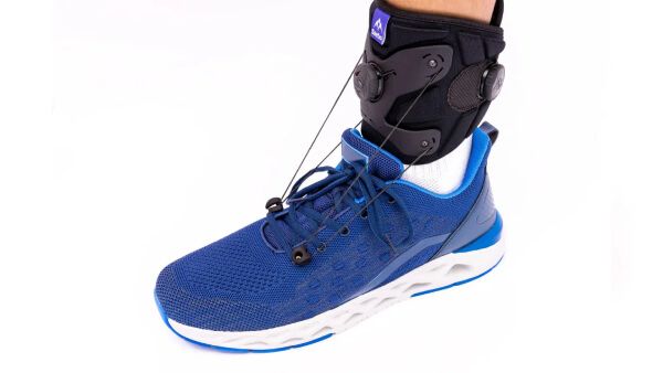 SaeboStep AFO Brace for Drop Foot worn with sneakers