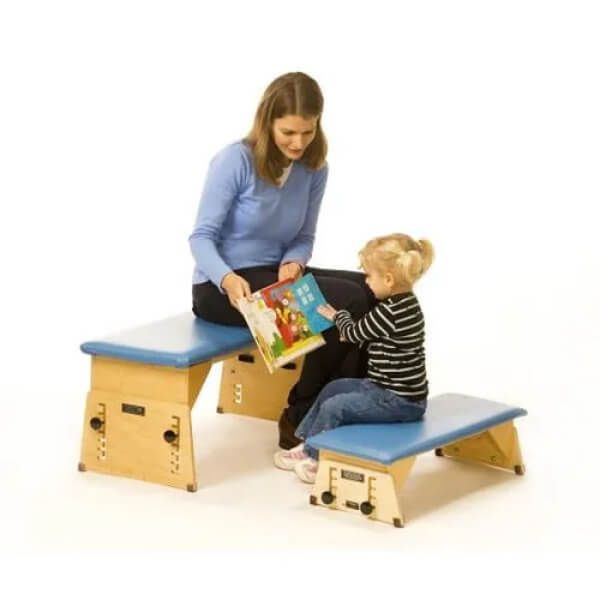 Therapist teaching child using the Kaye Therapy Bench