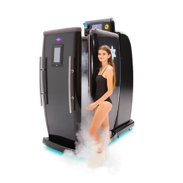 Woman going inside a cryotherapy chamber