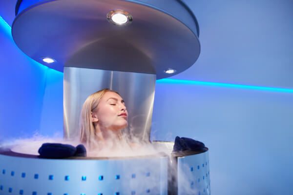Woman relaxing at a cryotherapy session