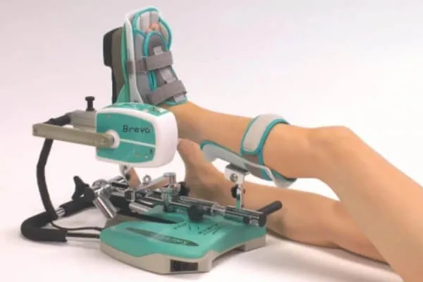 Woman using a Continuous Passive Motion Machine to increase her blood flow